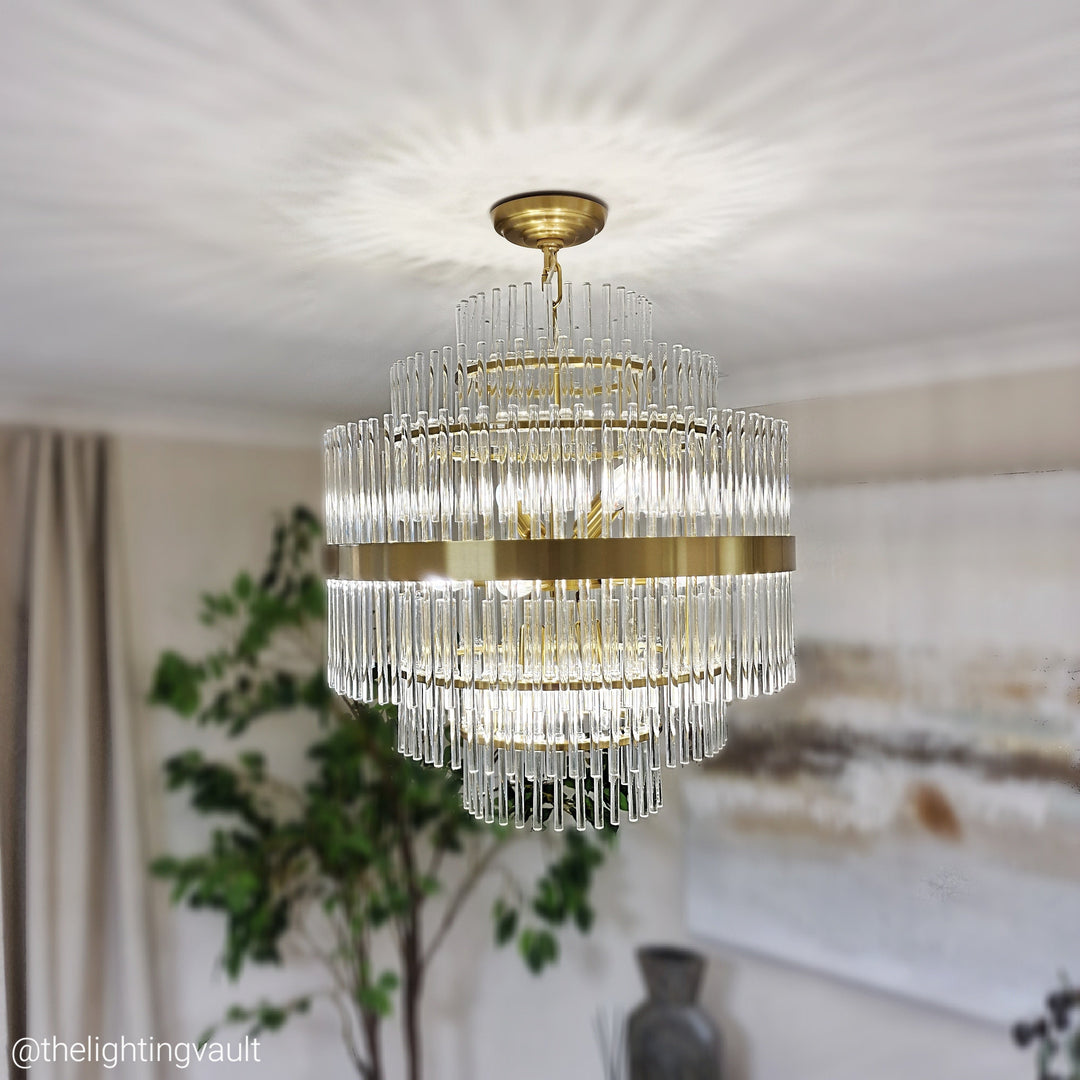 Luxury gold ceiling lights collection – modern chandeliers and flush mounts in warm elegant interiors by The Lighting Vault UK