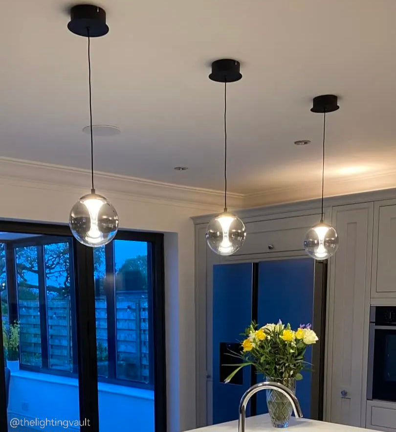 modern single pendant light with glass globe
