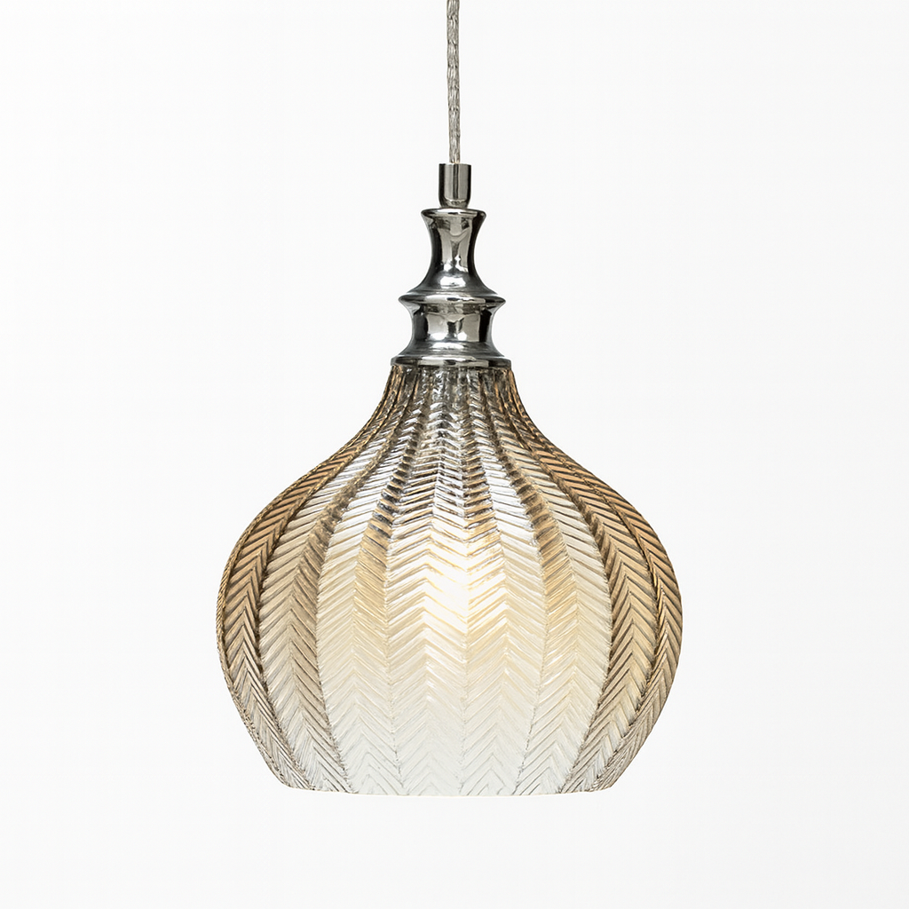 Bedford cognac glass pendant light with chrome detail on white background.