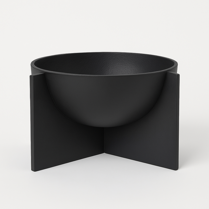 Black ribbed aluminium decorative bowl 25cm wide on white background.