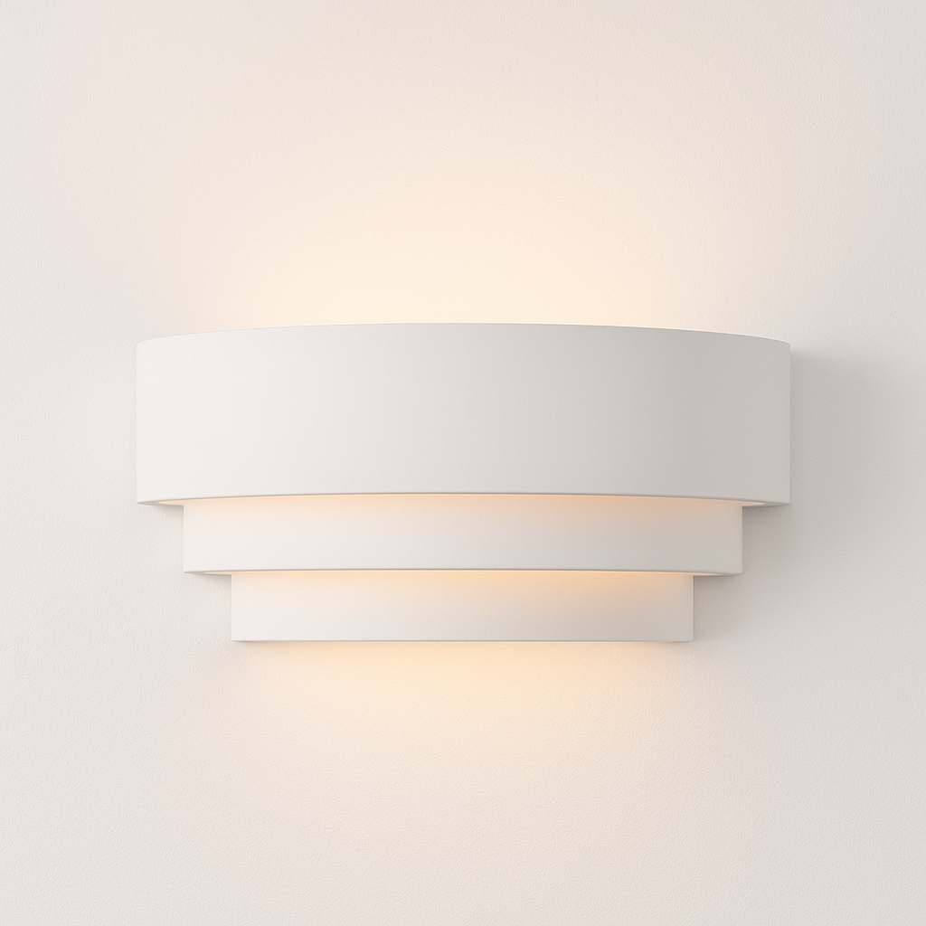 Borden white wall light – modern layered design, 31cm wide, emits soft up and down glow against white wall.