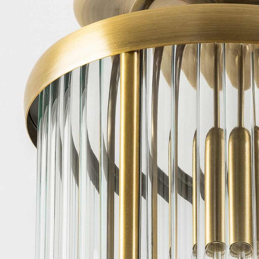 brass ribbed glass ceiling light close-up