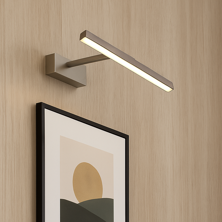 Contemporary brushed nickel LED picture light on wood panel wall