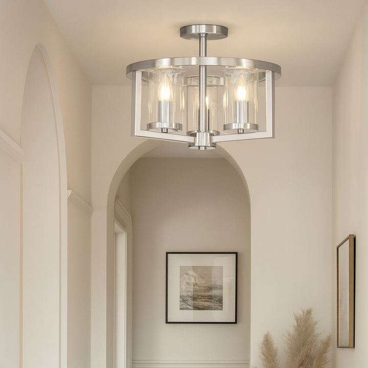 Caria satin silver flush ceiling light with clear glass shades in a luxury hallway, styled with arched doorway, artwork, and neutral décor.