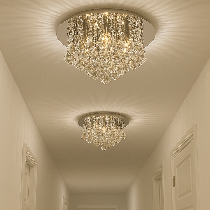 Two crystal flush ceiling lights spaced along a modern hallway with warm light patterns on the ceiling