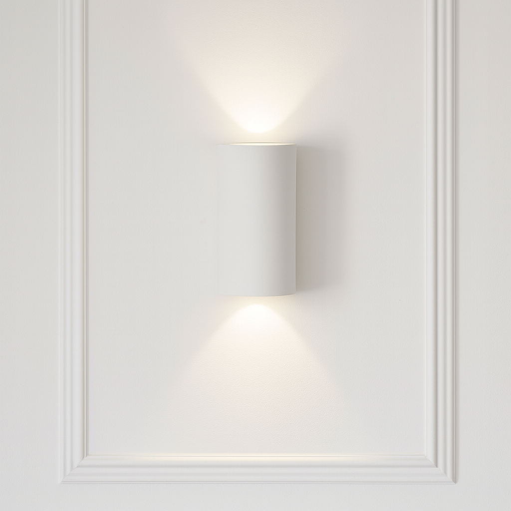 Denham paintable ceramic wall light with up and down glow