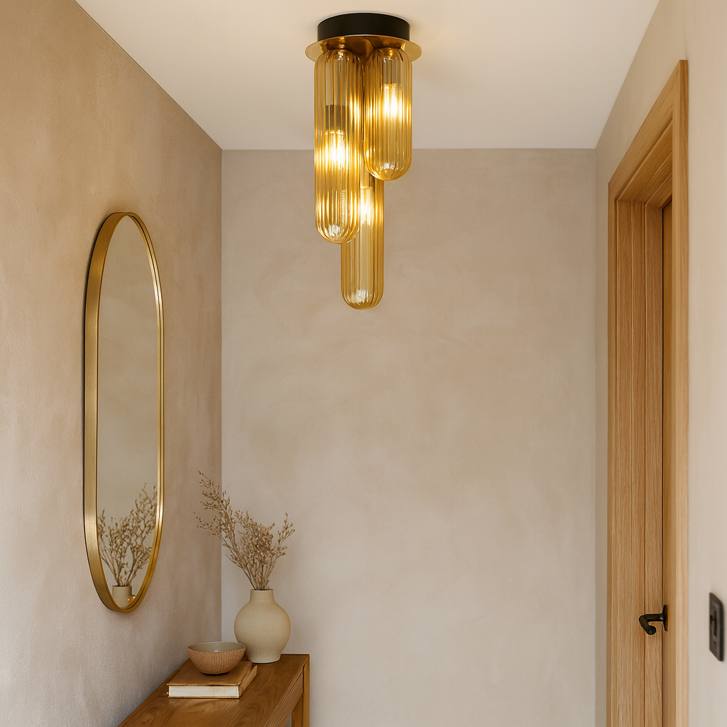 Florence gold flush ceiling light with ribbed amber glass shades styled in a warm Nordic hallway with gold accents and natural wood details
