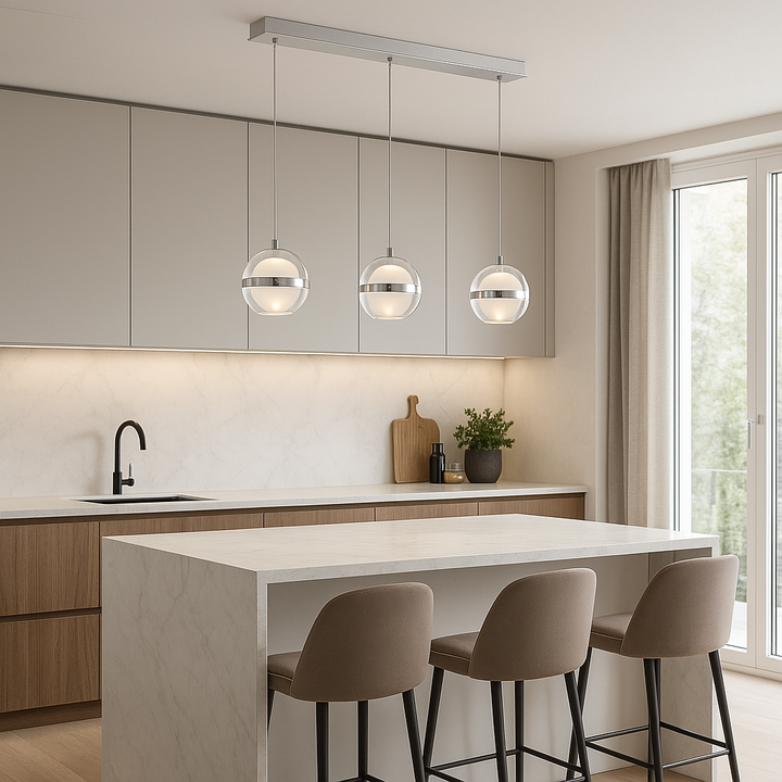 Forbes silver 3 light pendant bar with glass globes above kitchen island.