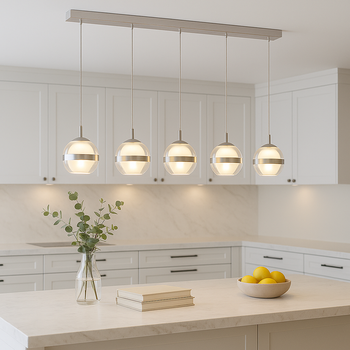 Forbes 5 Light Pendant Bar in silver, styled above a marble kitchen island with white cabinetry