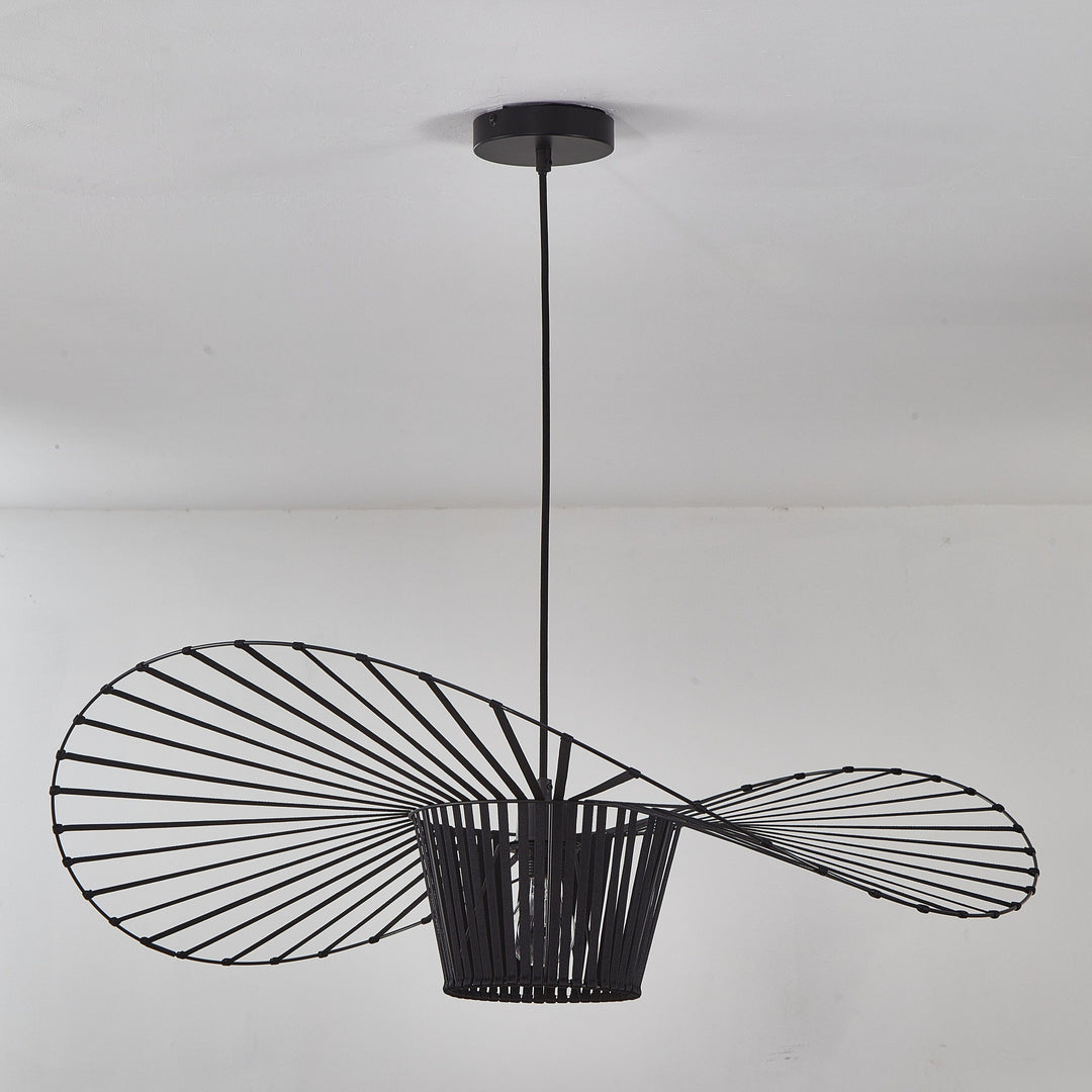 Black pendant light fixture on a white ceiling