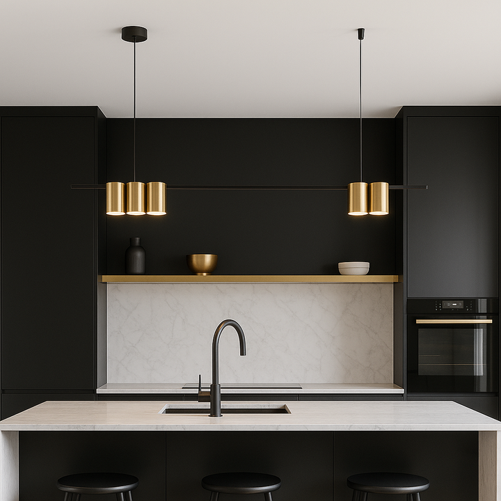 Luxury gold and black bar pendant light hanging above a modern kitchen island with marble and black cabinetry