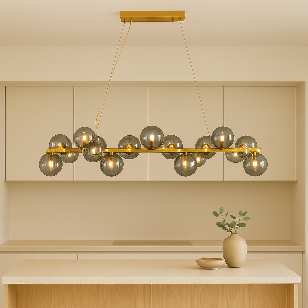 Luxury gold pendant bar light with smoked grey glass shades in a modern Scandi kitchen