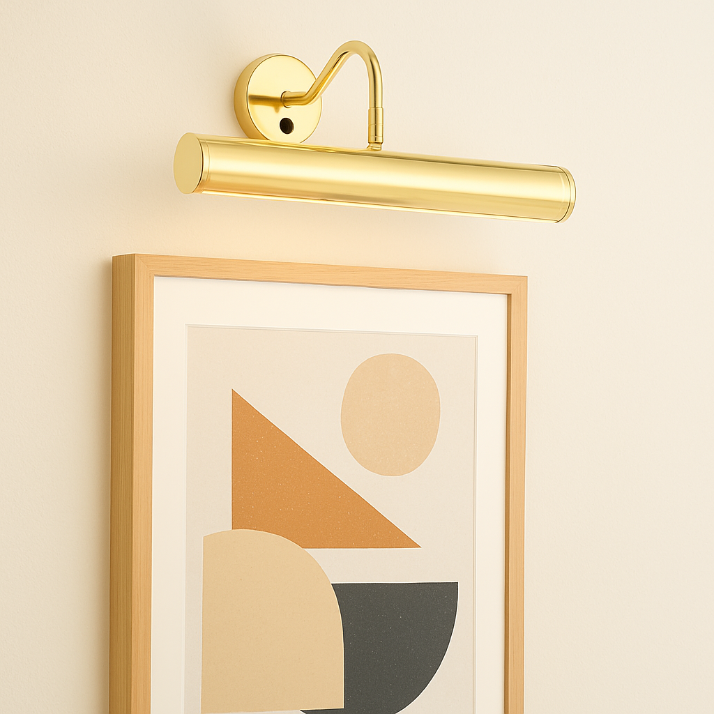 Gold picture wall light illuminating modern abstract geometric artwork in a wooden frame on a light wall