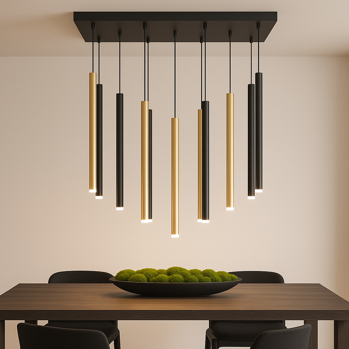 Lisbon black and gold rectangular pendant light above dining table with moss centerpiece – modern luxury ceiling lighting.