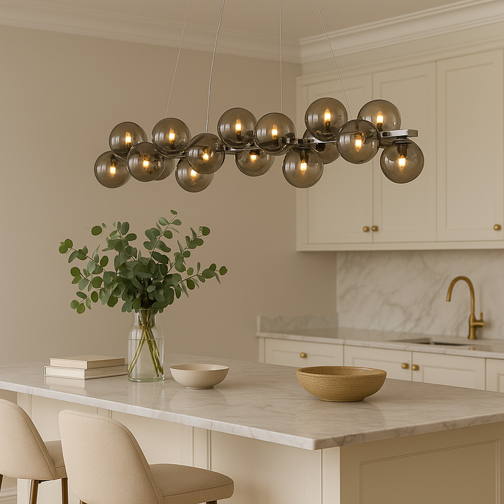 Melbourne 19 light pendant bar with smoked glass globes above marble kitchen island.