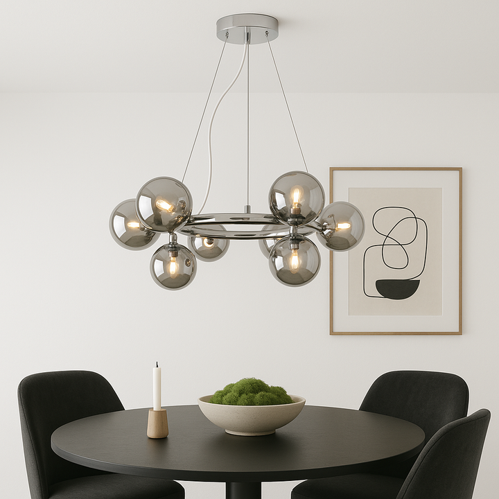 Melbourne pendant light with smoked glass globes above black round dining table