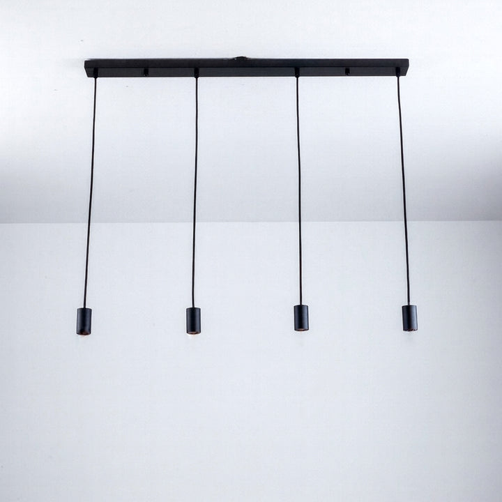 Roma 4 light black pendant bar with slim cylindrical caps and adjustable cables, shown without bulbs.