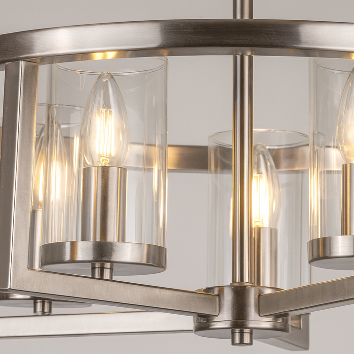 close up of satin silver ceiling light with glass shades