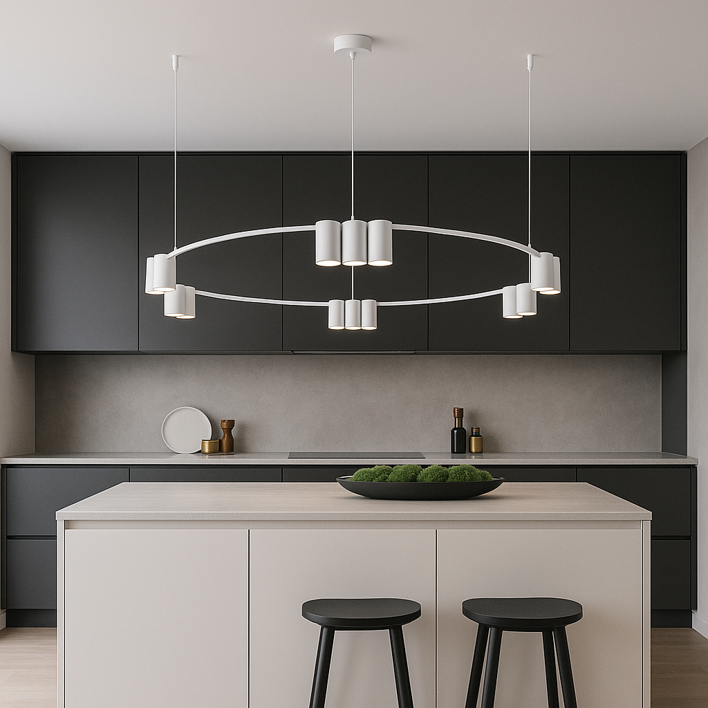 Modern white circular 12 light pendant with suspension cables above a dark kitchen with handleless cabinets and a white island with moss bowl