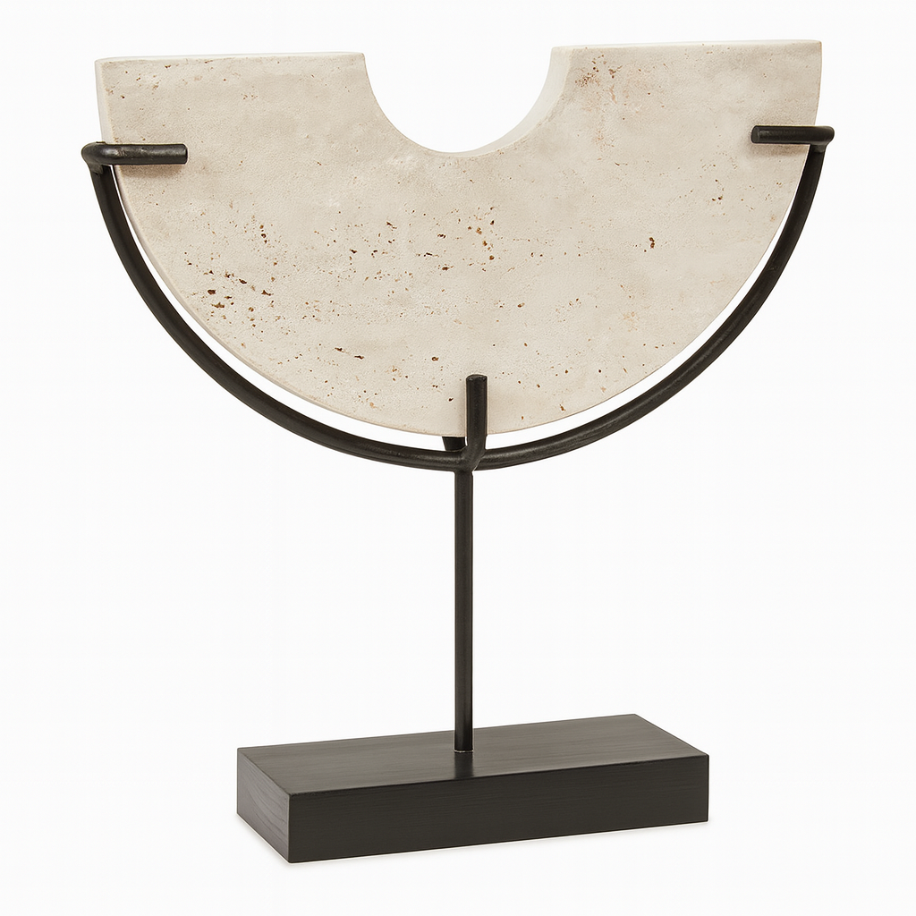 Luxury product image of white travertine semi-circular sculpture on black metal stand with soft shading against a clean white background.