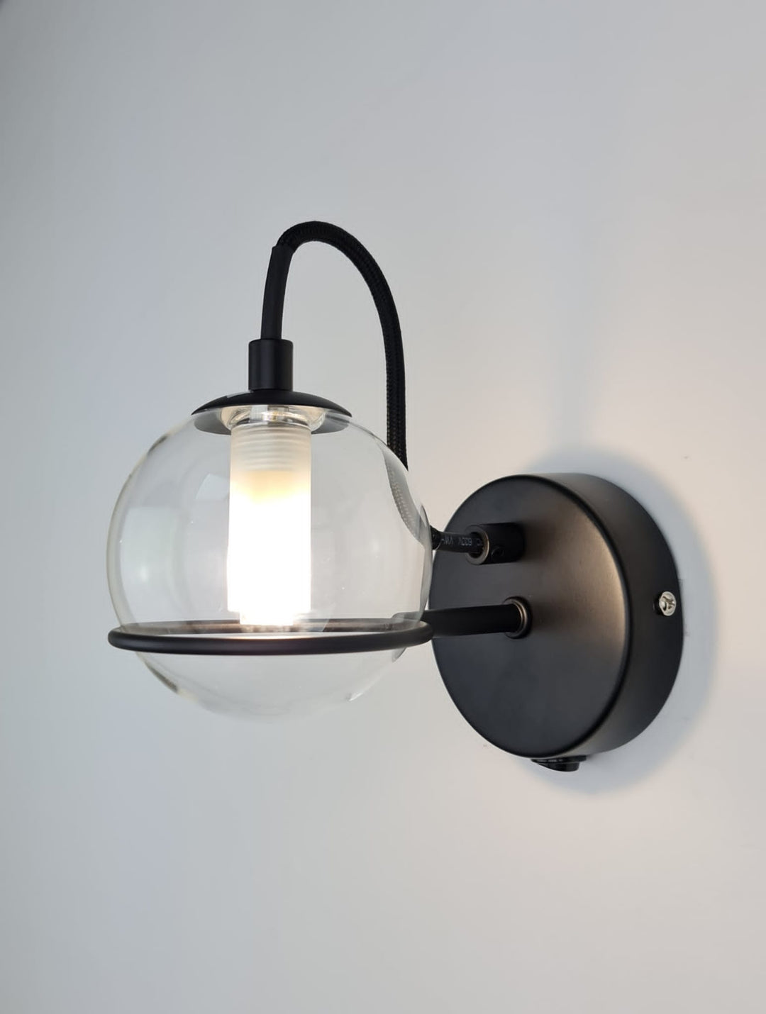 Melville matt black wall light clear glass shade