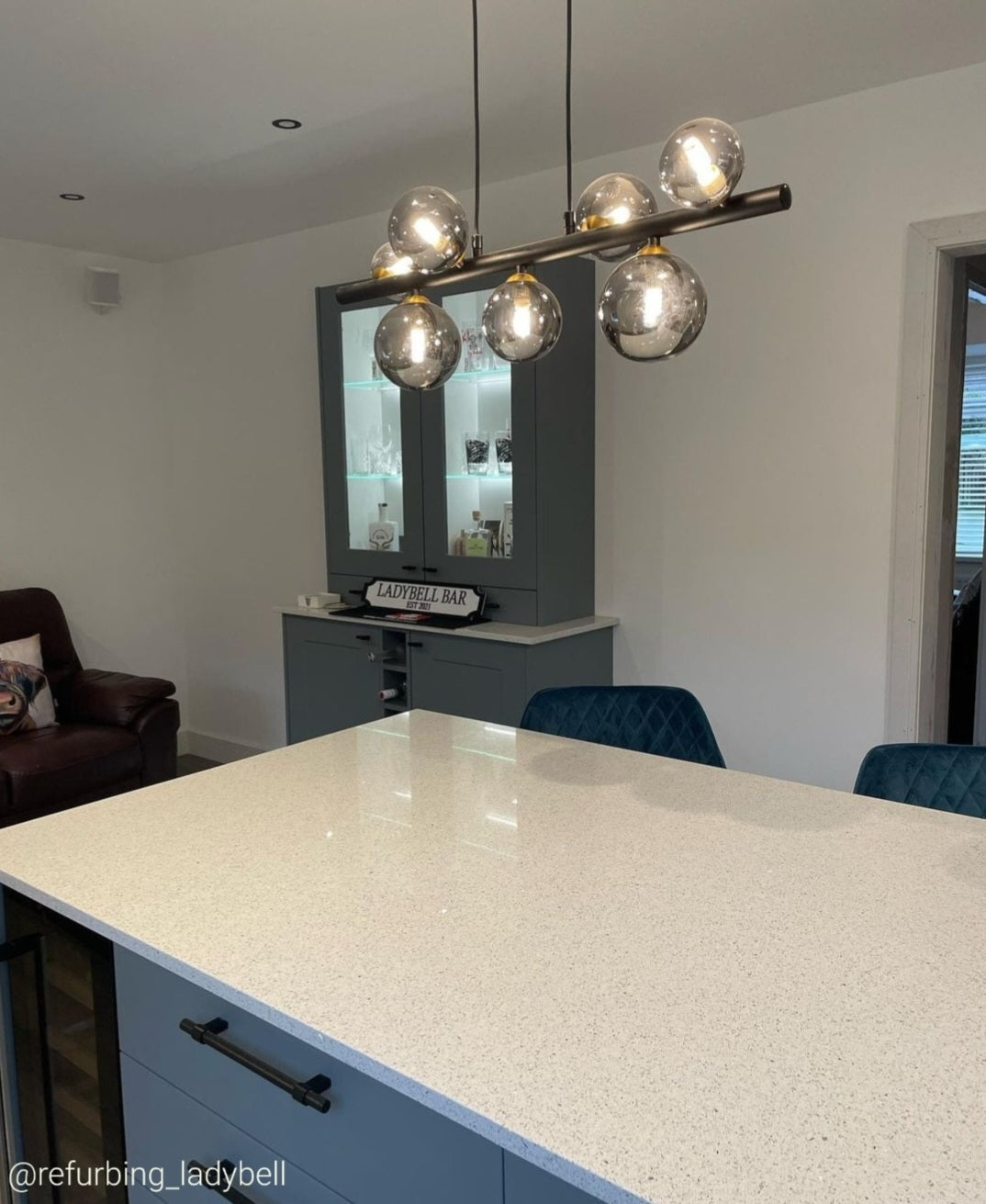 Marlow matt black and gold pendant bar with smoked glass shades