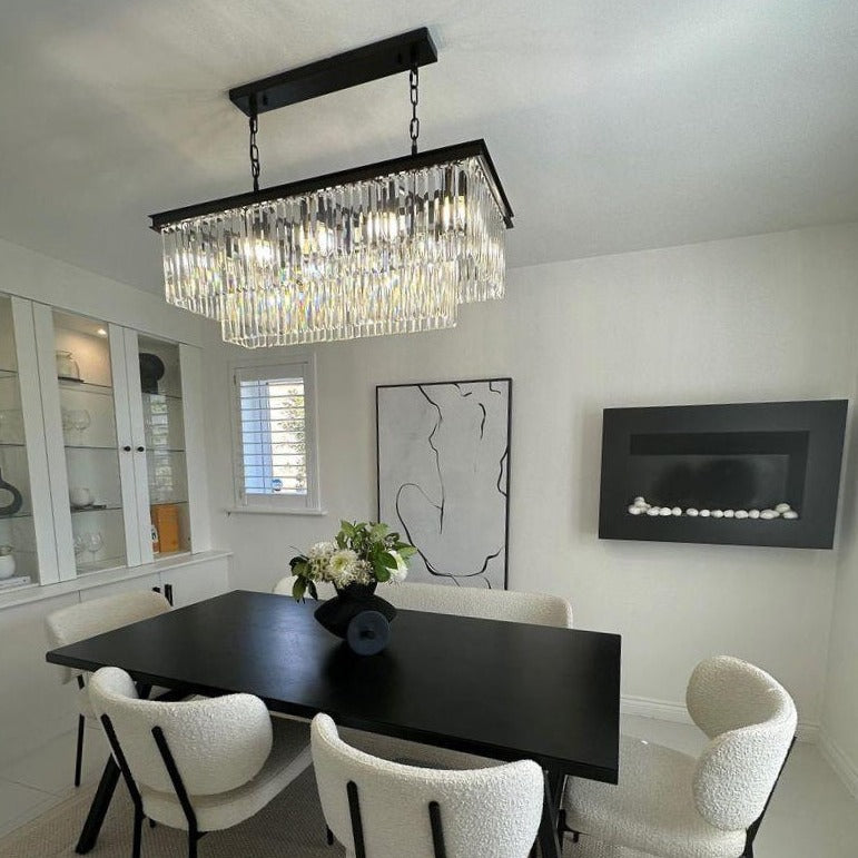 Modern rectangular pendant bar light above a dining table