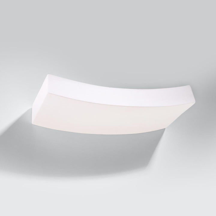 Curved ceramic plaster wall light