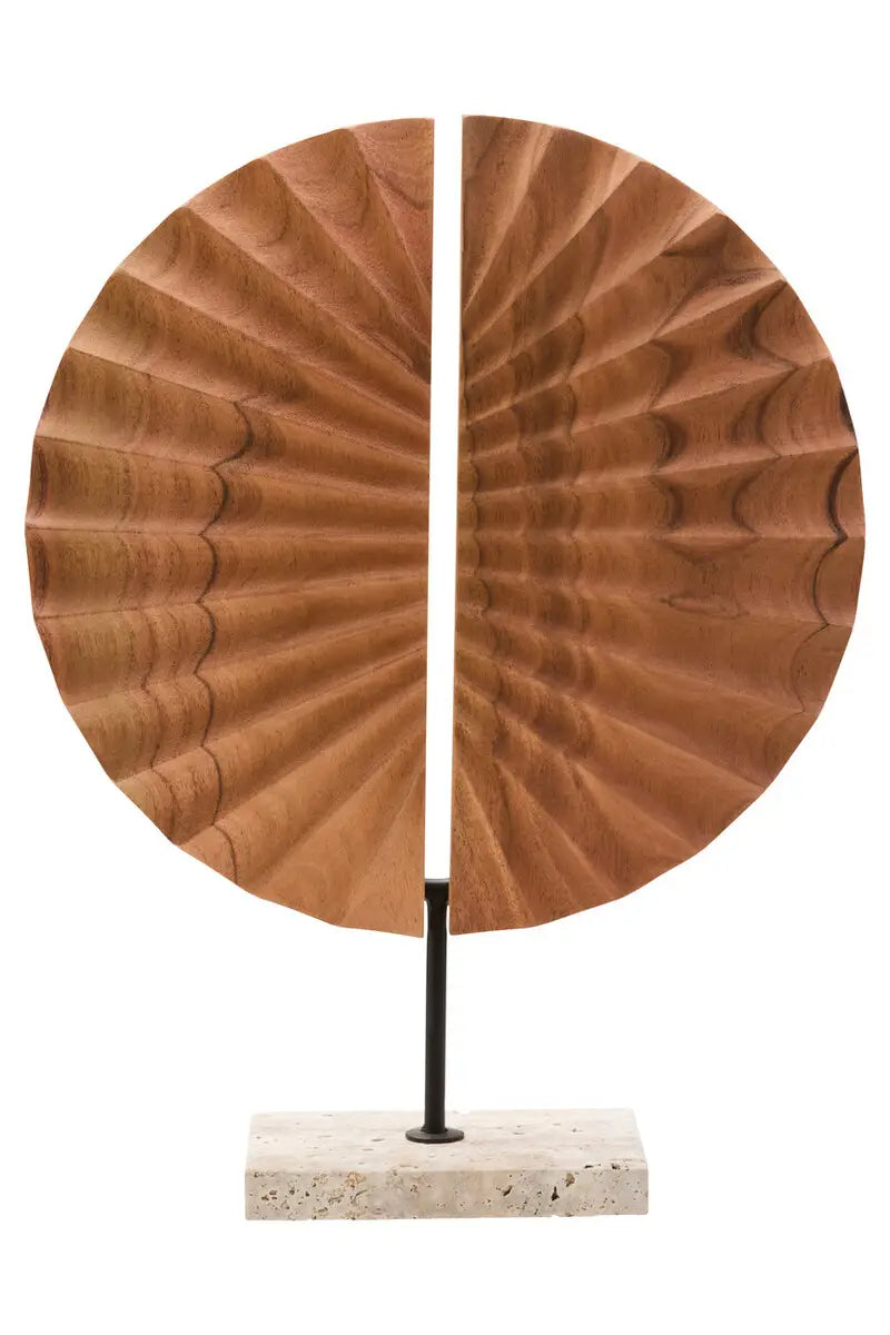 Wooden sculpture with a circular design on a white background