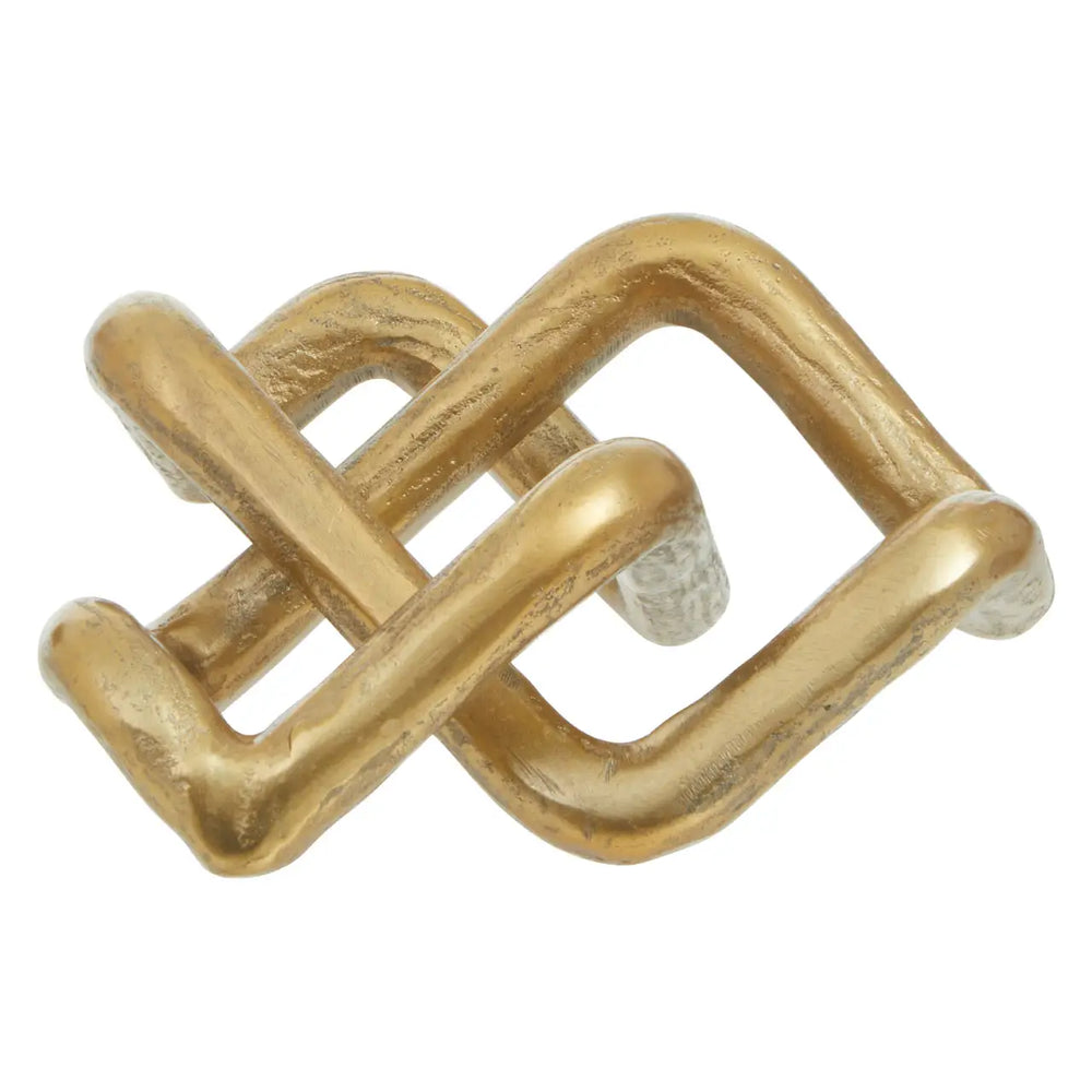 Gold metal buckle on a white background