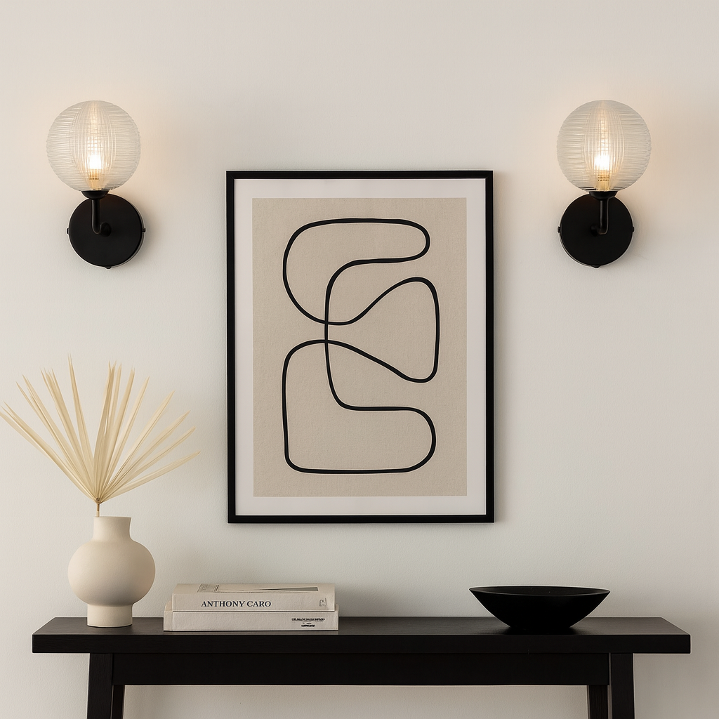 Two Albany black wall lights with console