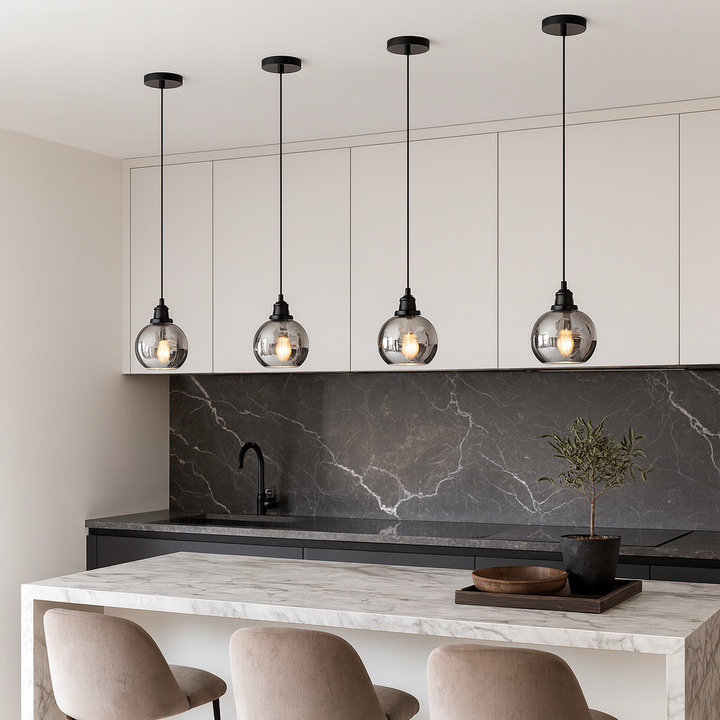 four 20cm smoked glass pendants over luxury kitchen island