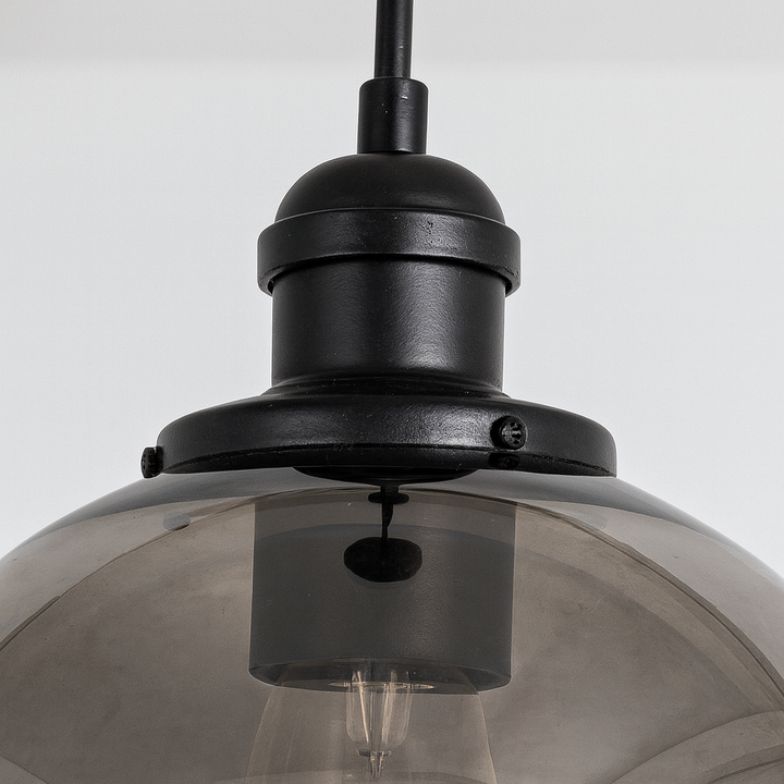 close-up smoked glass pendant top detail with screws