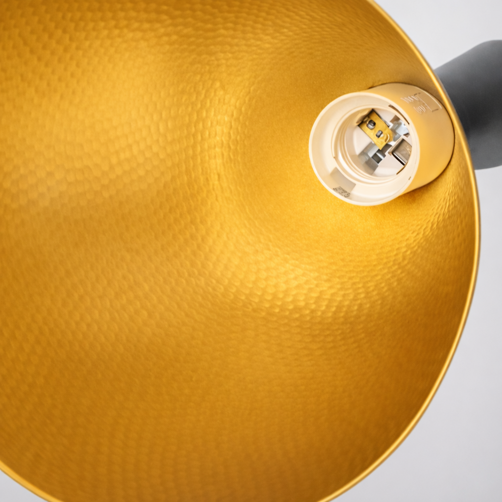 Warm gold dimpled pendant light interior