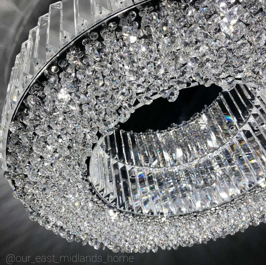 Close-up of Salzburg Large Polo Flush chandelier showing crystal blocks, button skirt and polished chrome finish.