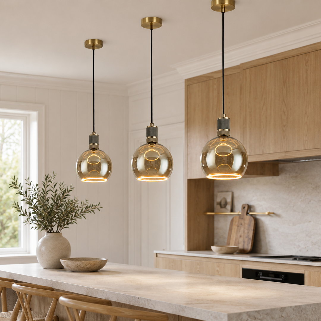 Antique brass Roma pendants above kitchen island