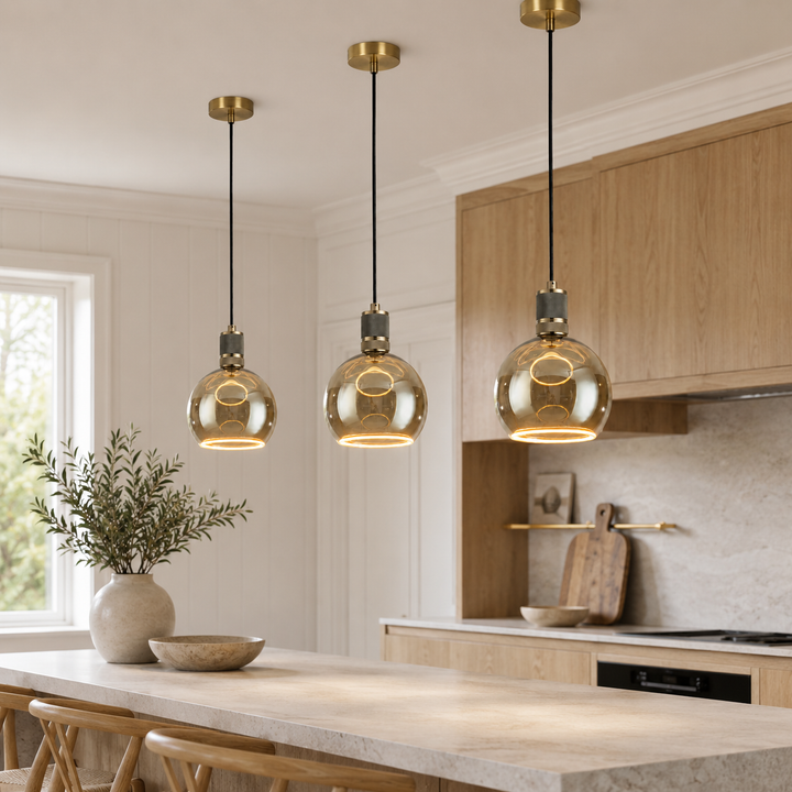 Antique brass Roma pendants above kitchen island