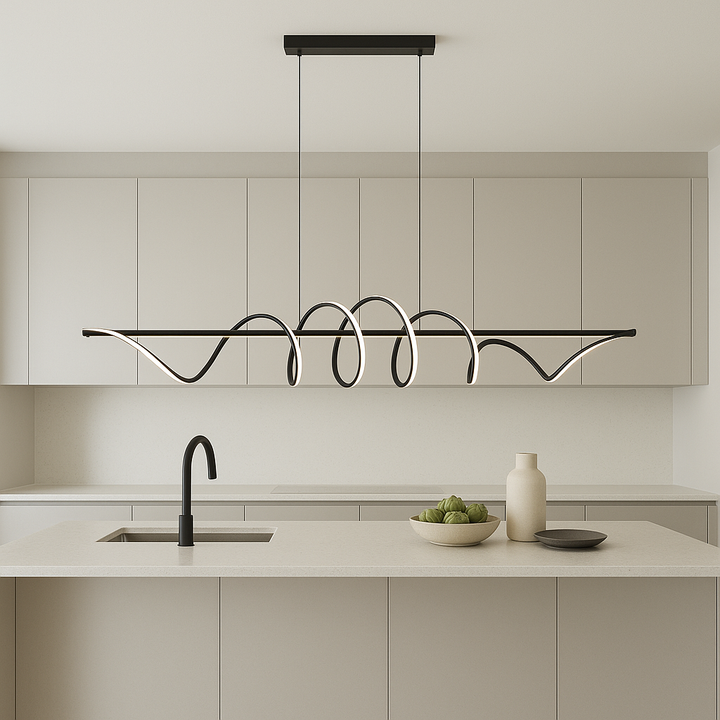 Berlin LED pendant light 111cm wide in modern kitchen with white cabinets, black accents, and large quartz island