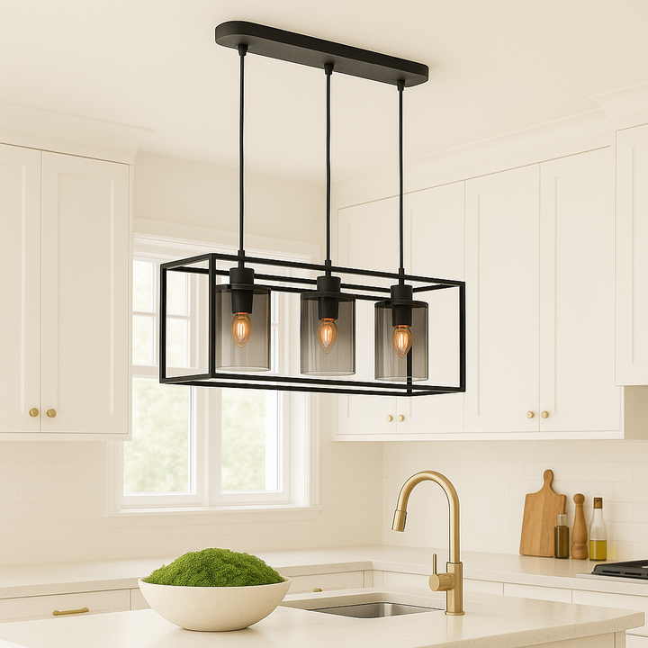 Black 3 light rectangular pendant with smoked glass shades above a white kitchen island.