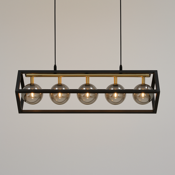 Black and gold rectangular pendant light with five smoked glass globes against a plain wall