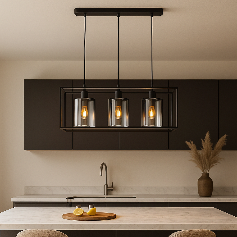 Black 3 light rectangular pendant with smoked glass shades over a marble kitchen island.