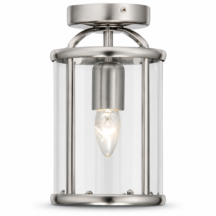 Cambridge satin silver semi flush lantern ceiling light with clear glass panels and candle bulb on a white background.
