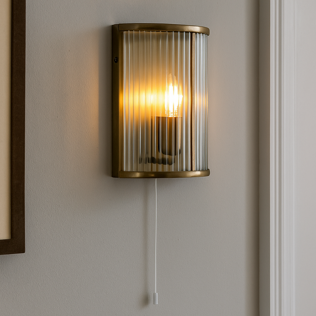 Carlton brass ribbed glass wall light with pull cord
