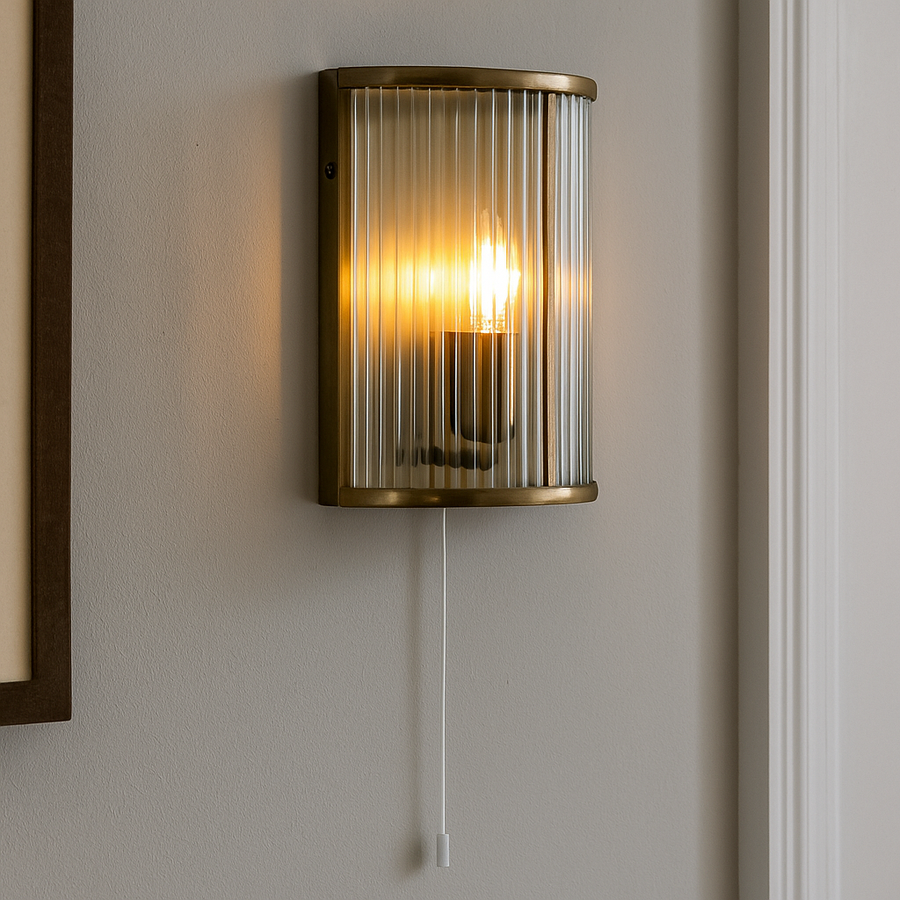 Carlton brass ribbed glass wall light with pull cord