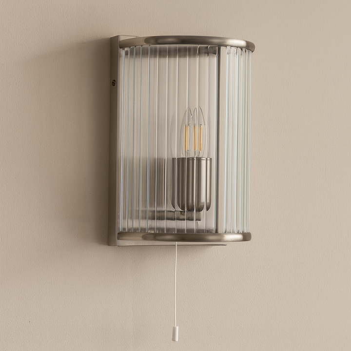 Carlton satin silver ribbed glass wall light with pull cord turned off