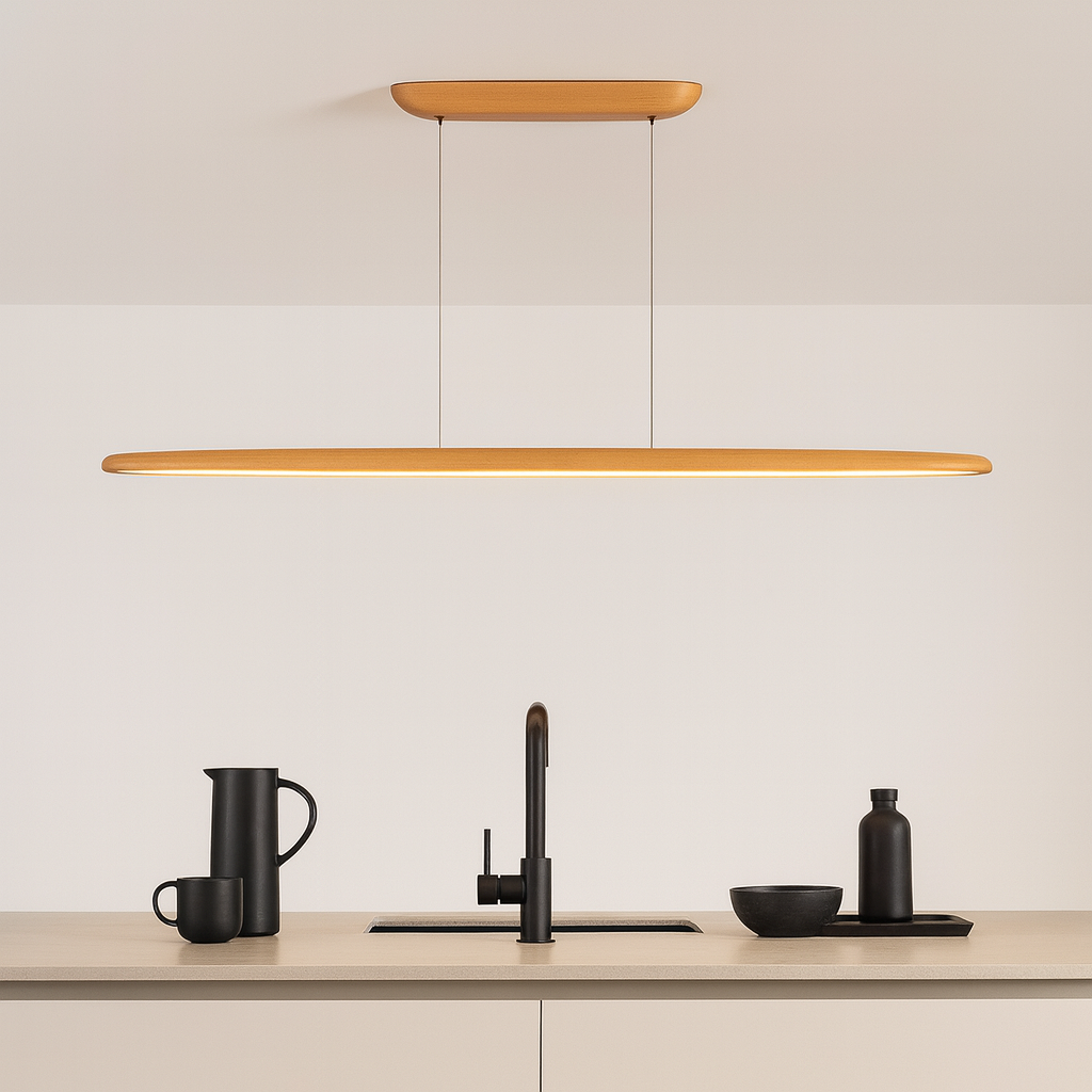 Ceduna Natural Wooden LED Pendant Bar light above a modern Nordic kitchen island with minimalist black accessories.