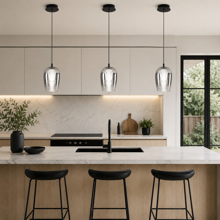 Cobar 4000K pendants over black accent kitchen island