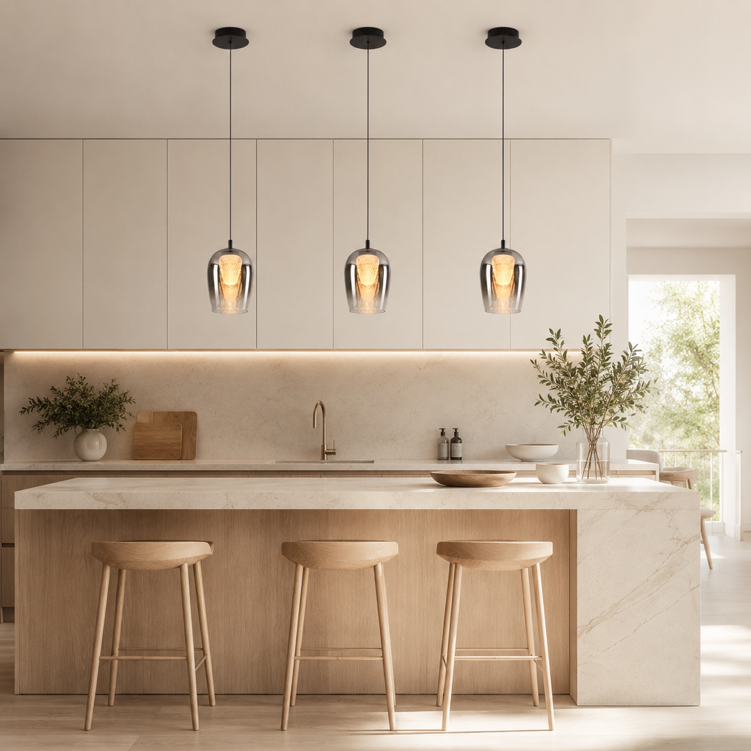 Cobar smoked glass pendants over kitchen island