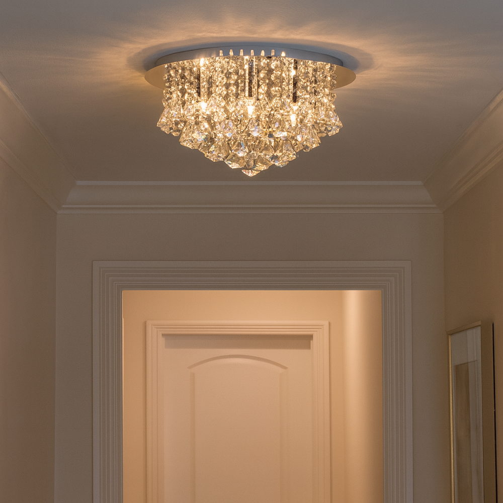 Crystal flush ceiling light with cascading prisms in a modern hallway setting