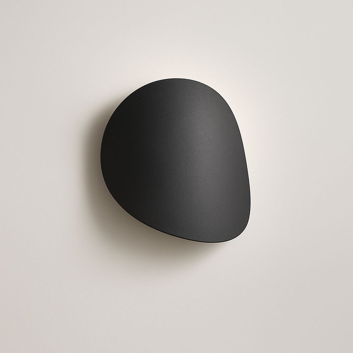 Delta black wall light with matte finish on a clean neutral background.